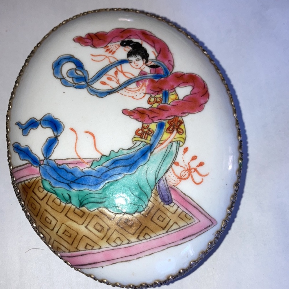 Hand painted oriental lady scene on porcelain disk, metal bottom & trim. $19